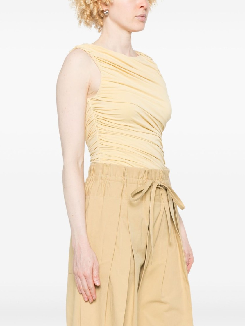 Abadia Draped Pastel Yellow Bamboo Rayon Bodysuit In Yellow