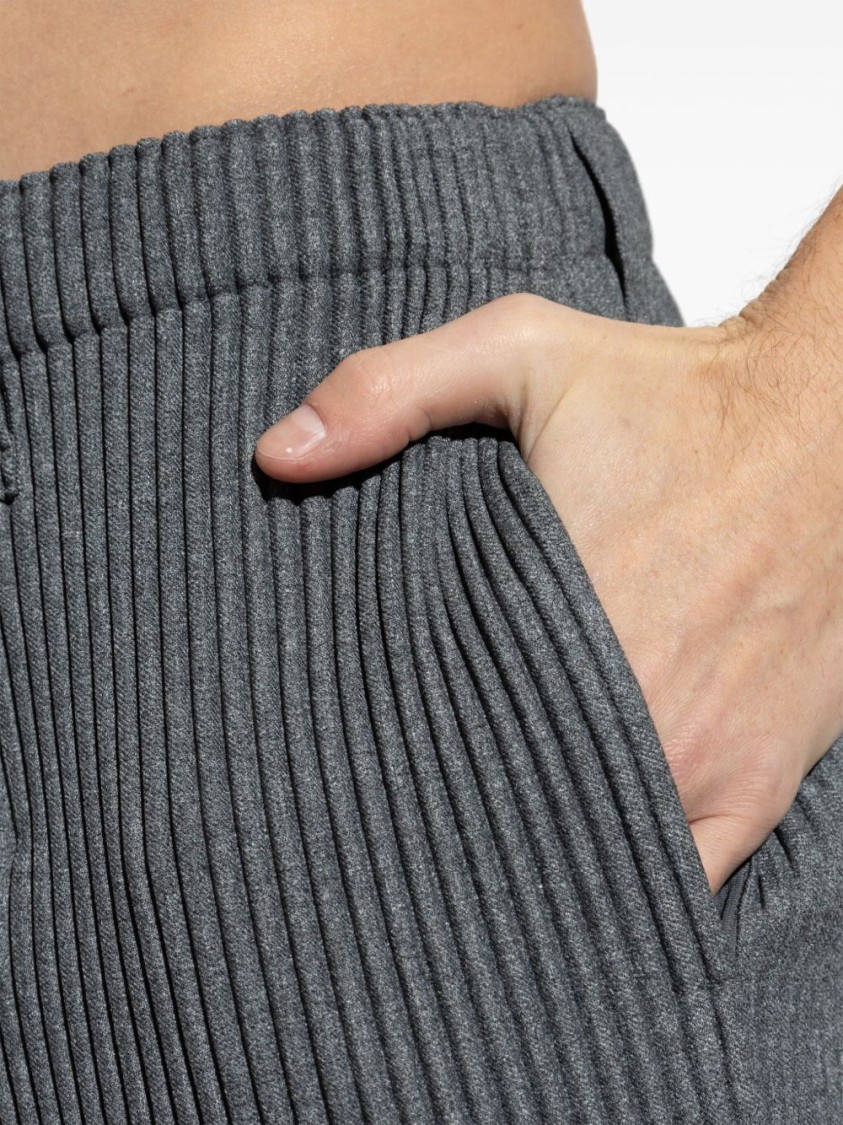 ISSEY MIYAKE HOMME PLISSÉ ISSEY MIYAKE PLEATED TROUSERS WITH ELASTICATED WAISTBAND