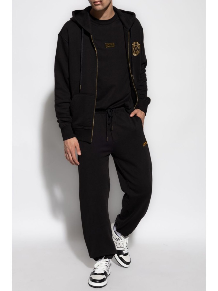 Shop Versace Jeans Couture Classic Black Trousers With Relaxed Fit And Tapered Legs
