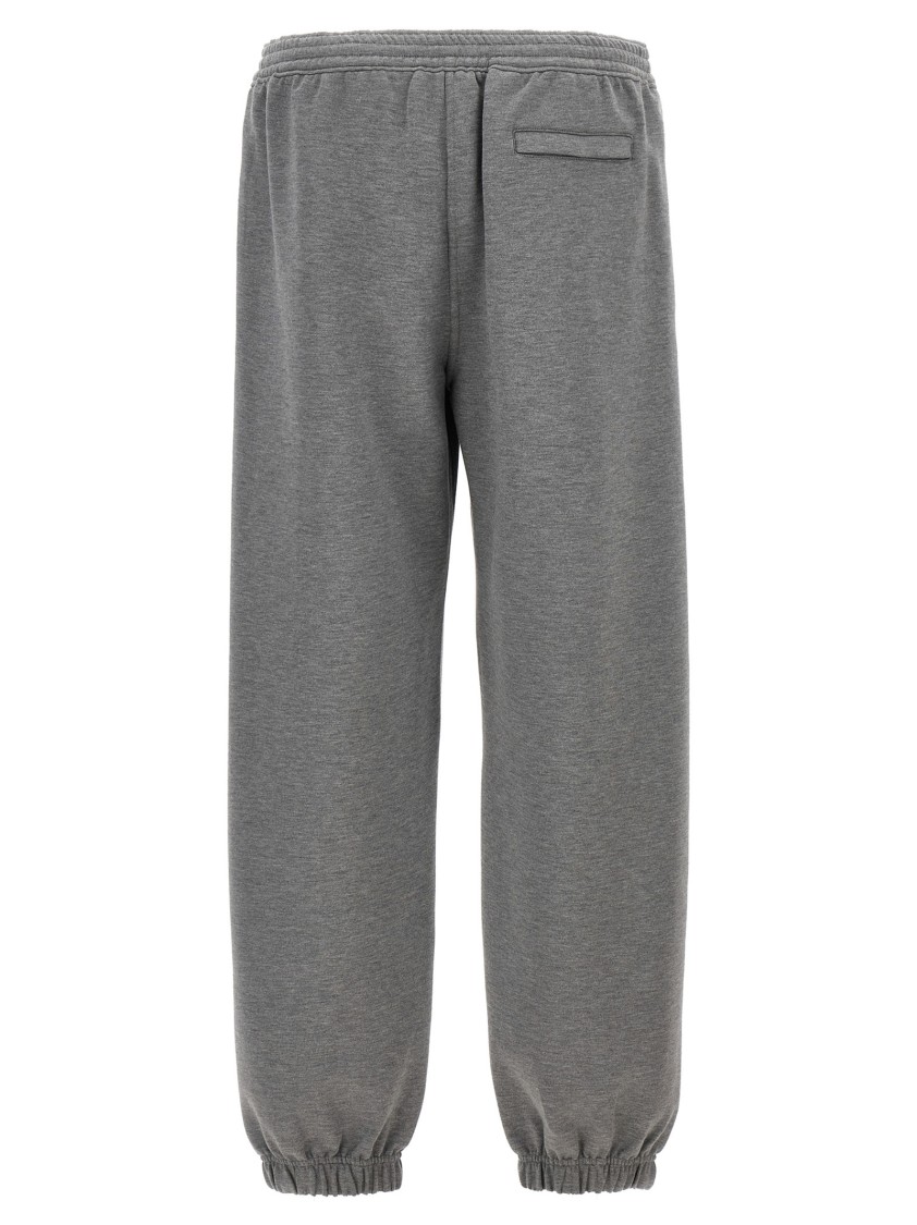 Givenchy Metallic Logo Joggers In Gray
