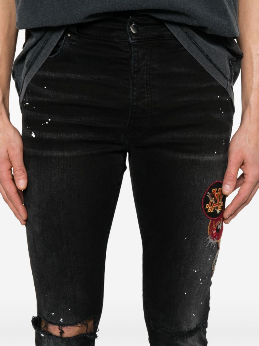 Shop Amiri Slim Fit Black Distressed Jeans With Colorful Patches