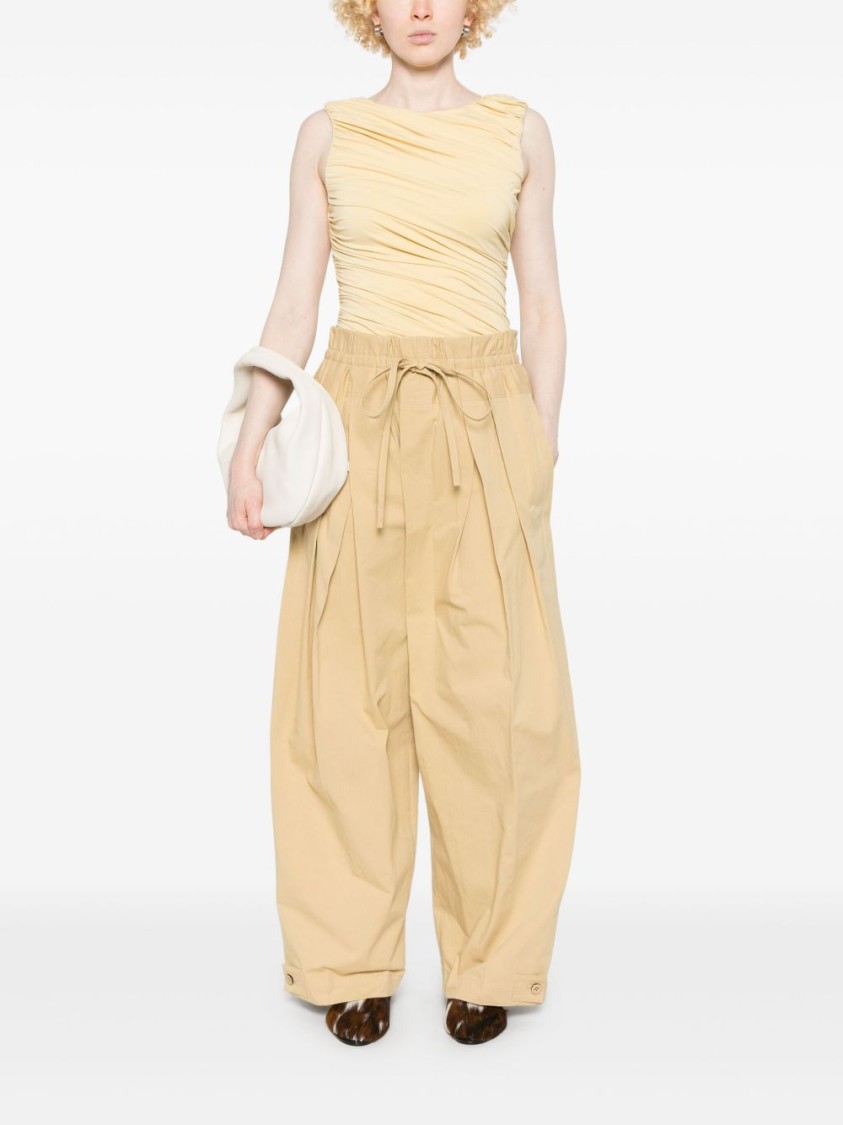 Abadia Draped Pastel Yellow Bamboo Rayon Bodysuit In Yellow