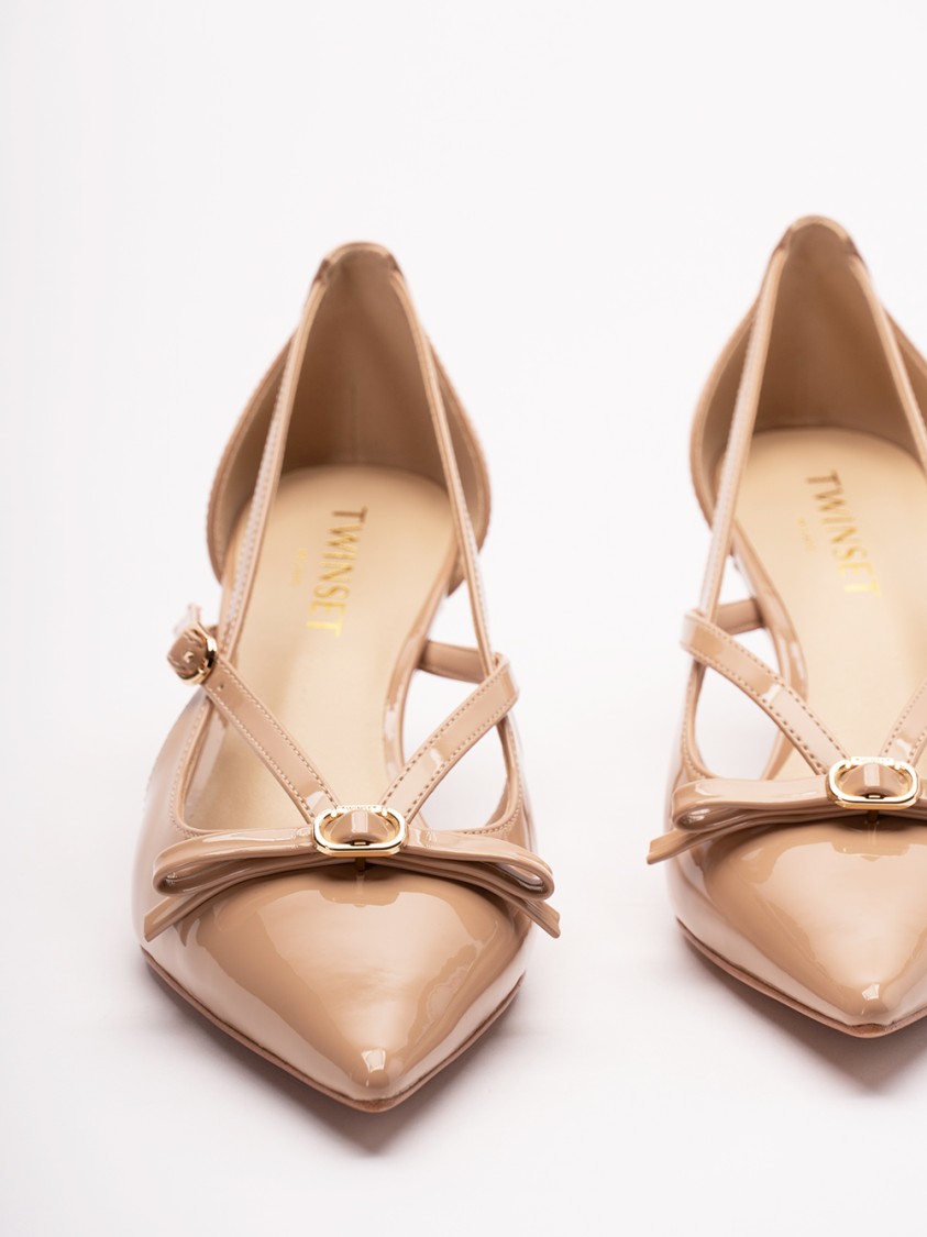 Twinset Twin-set Pointed Toe Pumps With Delicate Bow Accent In Neutral