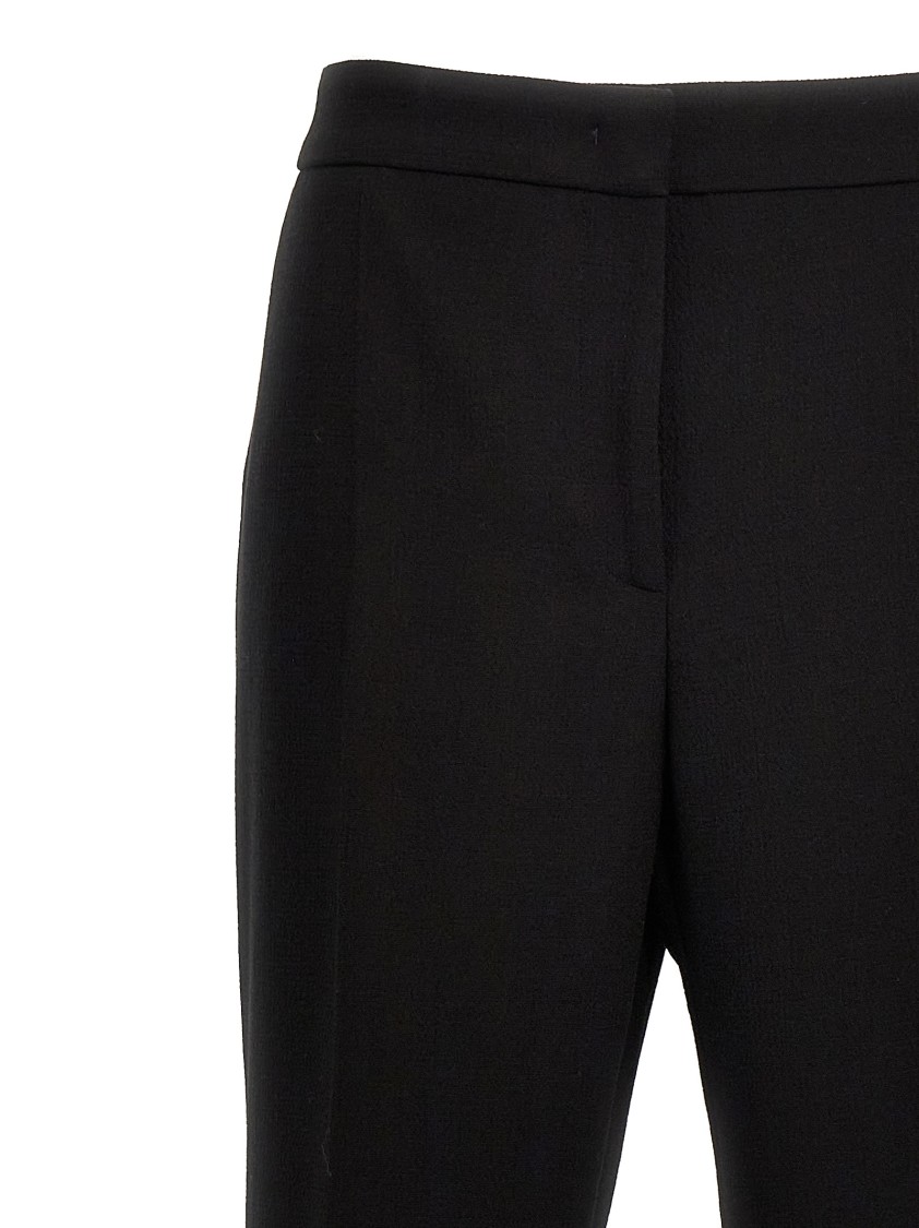 Moschino Wide-leg Wool Blend Crepe Pants With Central Pleat In Black