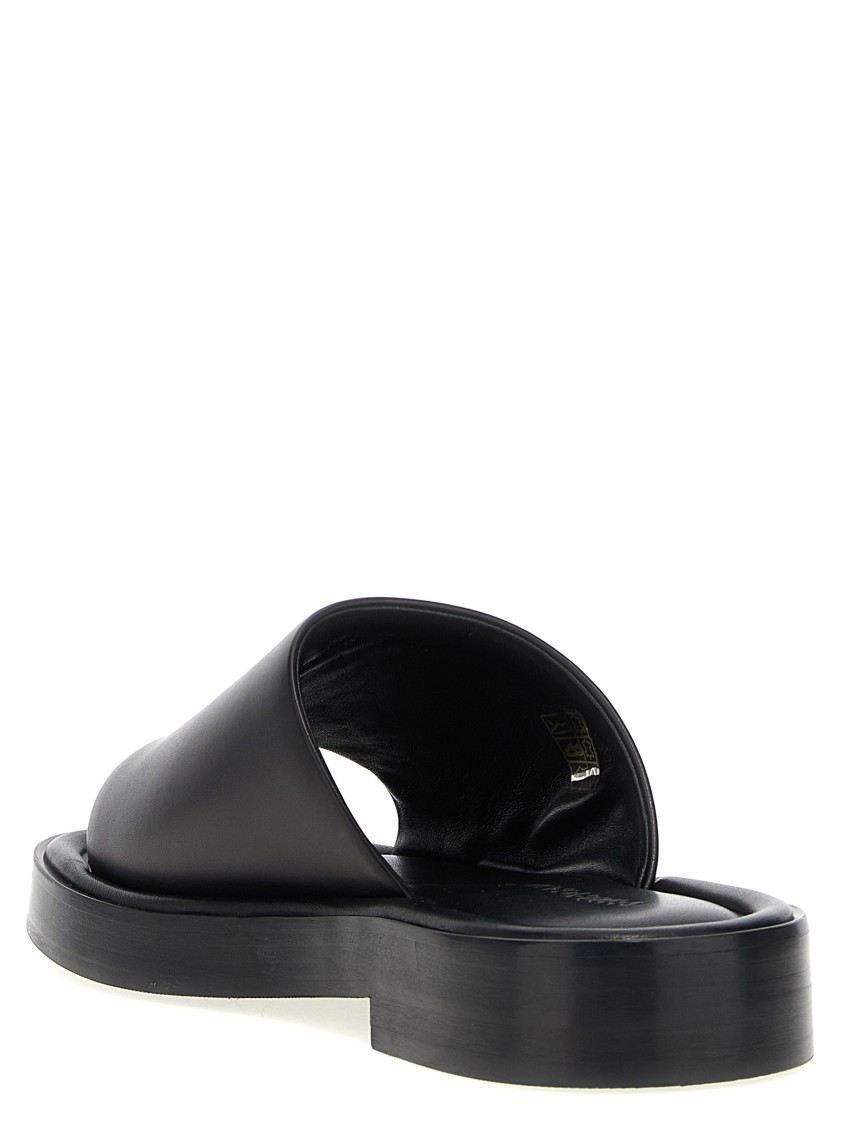 Ferragamo Logo Embossed Leather Slides In Black