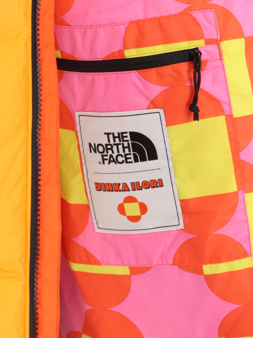 Shop The North Face Two-tone Padded Gilet In Orange And Yellow Nylon
