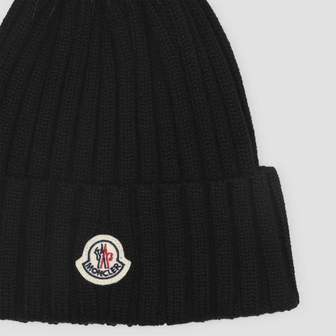 Moncler Ribbed Knit Hat With Fluffy Pom-pom In Black