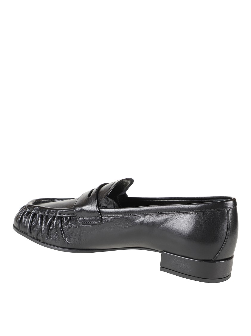 Prada Rounded Toe Loafers With Textured Detailing And Low Block Heel In Black