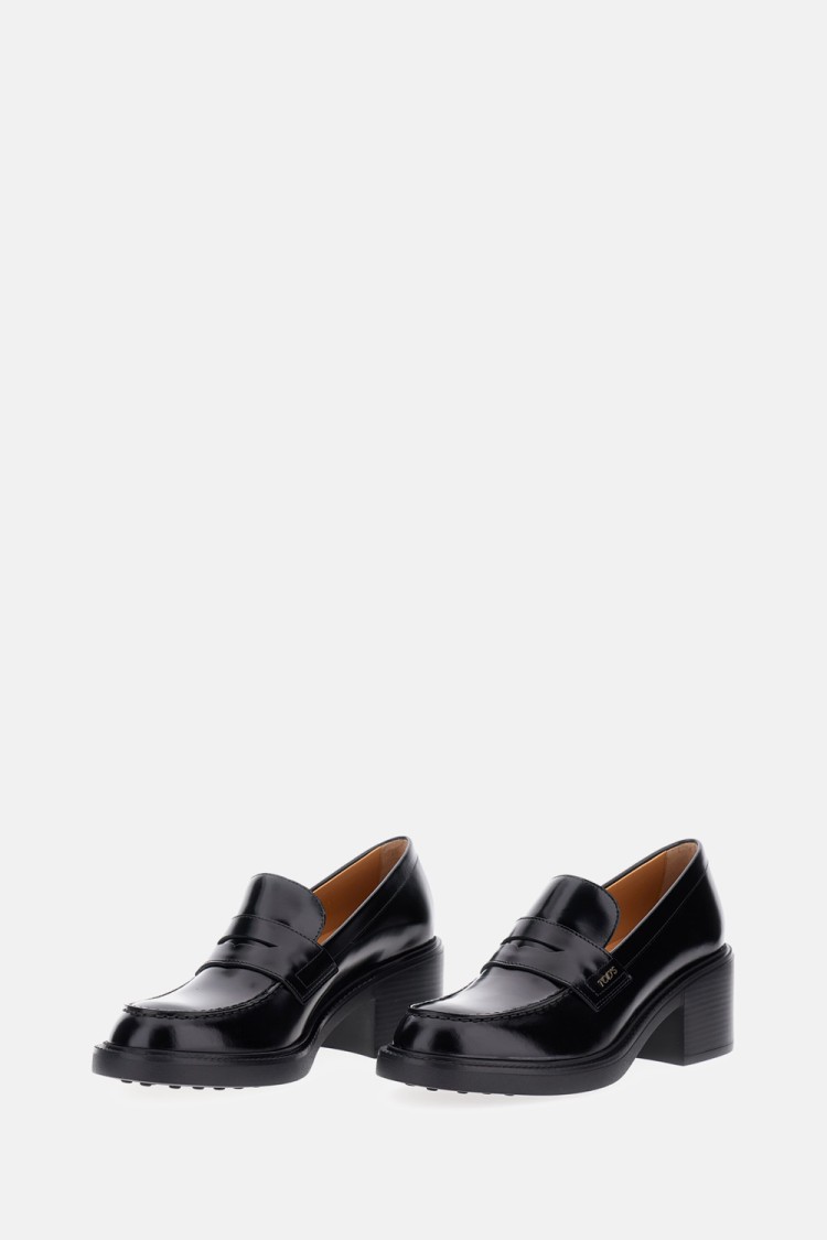 Tod's Black Loafers With Penny Slot And Logo Lettering On The Side In Black