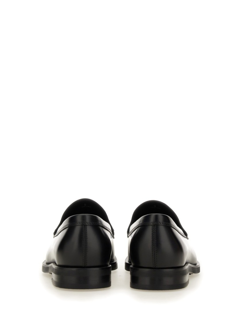 Tod's Smooth Leather Moccasin Loafers With Subtle Stitching In Black