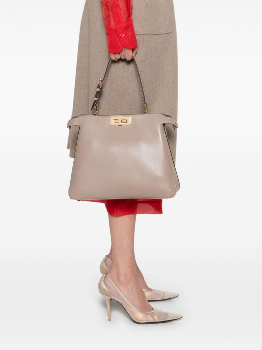 Shop Fendi Structured Handbag With Gold-tone Clasp In Pink