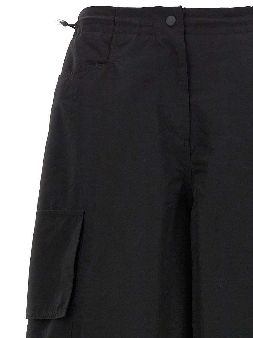 Palm Angels Wide-leg Nylon Parachute Pants With Adjustable Cuffs In Black