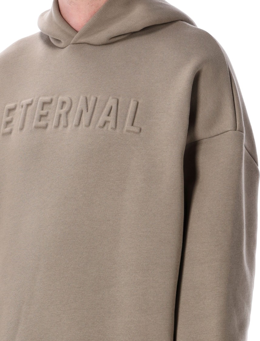Shop Fear Of God Relaxed Fit Dusty Beige Hoodie With Embossed Logo