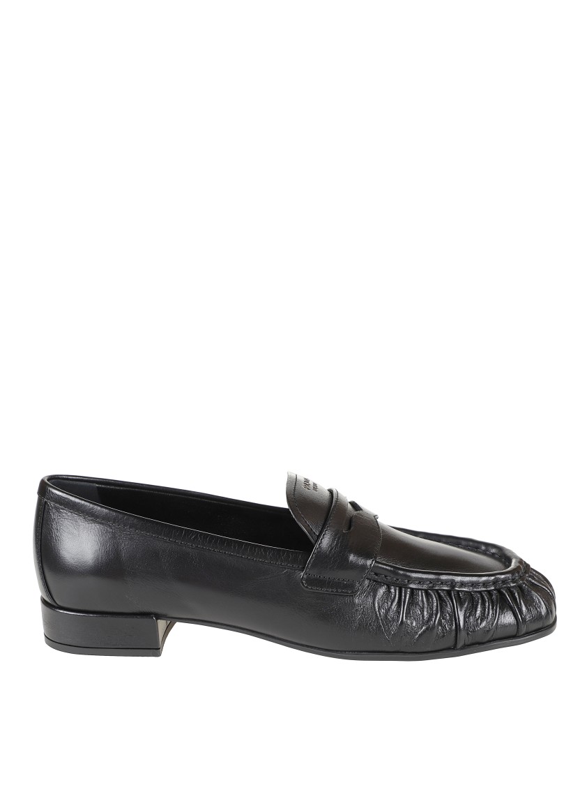 Prada Rounded Toe Loafers With Textured Detailing And Low Block Heel In Black