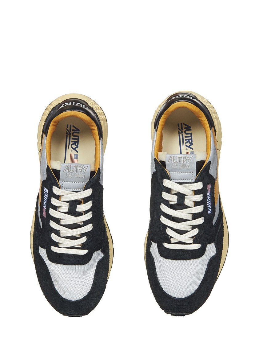 Autry Low Sneaker With Contrast Stitching And Mesh Panels In Black