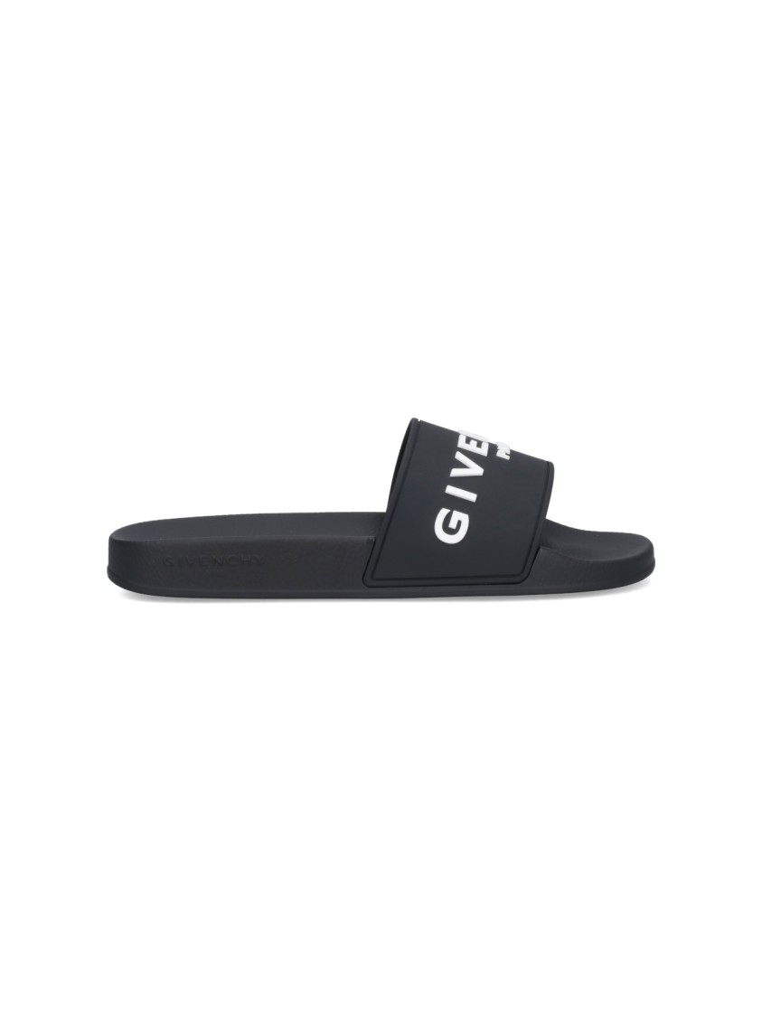 Givenchy Black Logo Embossed Slides In Black