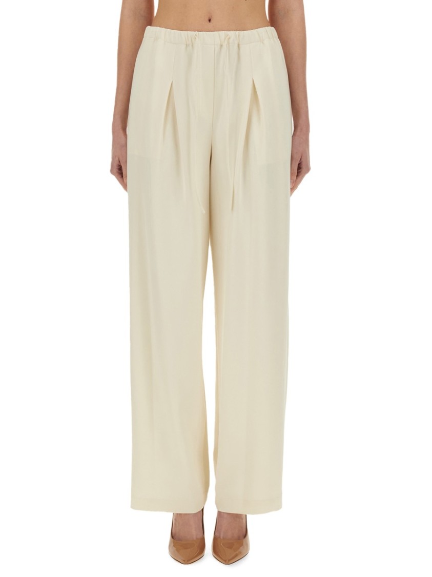 Theory Pleated High-Waisted Pants With Relaxed Fit | THE LIST