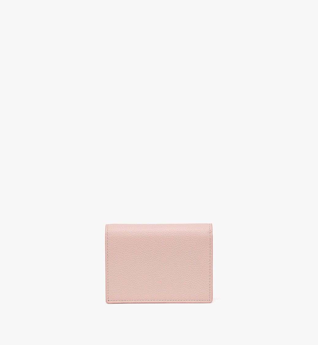 Mcm Embossed Leather Wallet In Pink