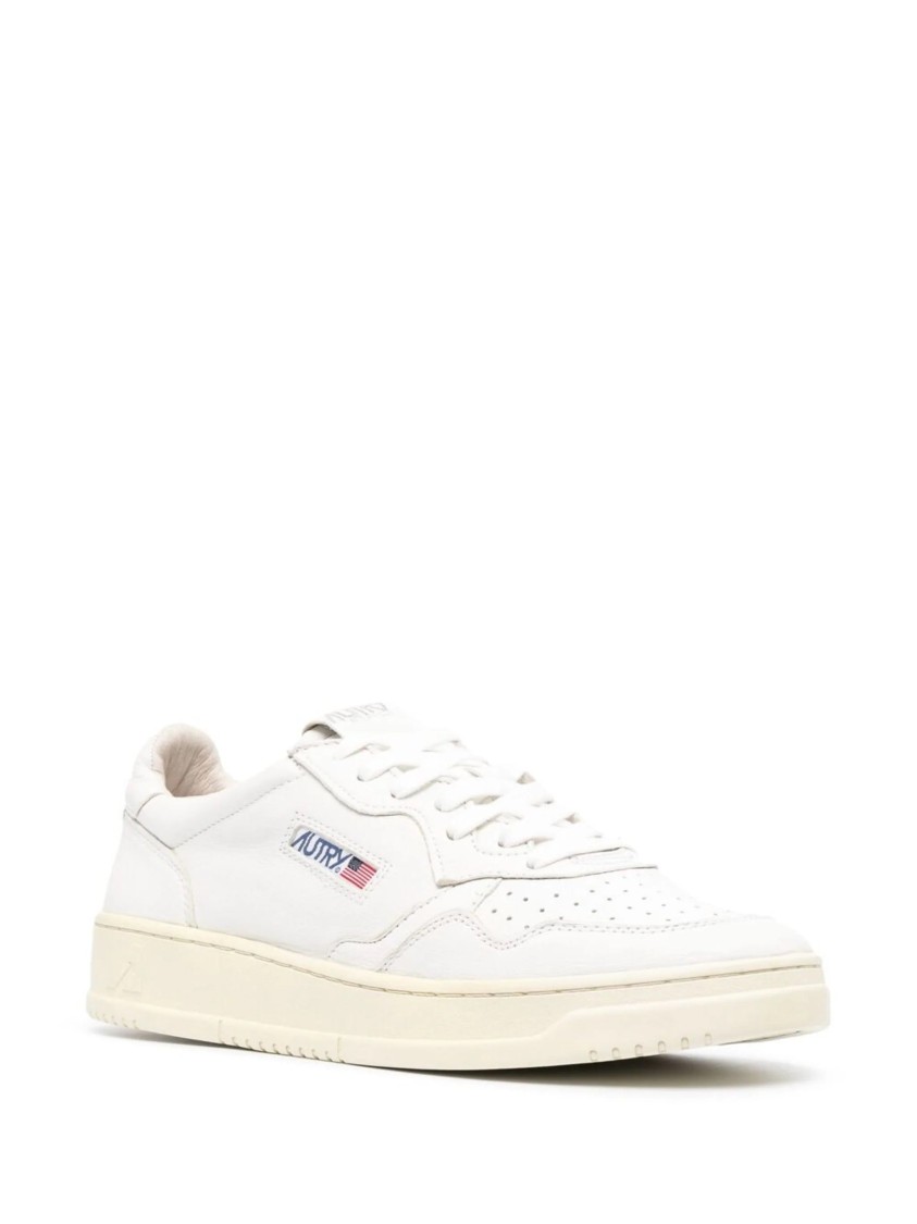 Autry Low Sneaker With Perforated Detailing And Rubber Sole In White