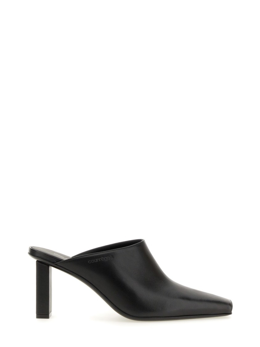 COURRÈGES COURRÈGES POINTED TOE MULES IN SMOOTH LEATHER