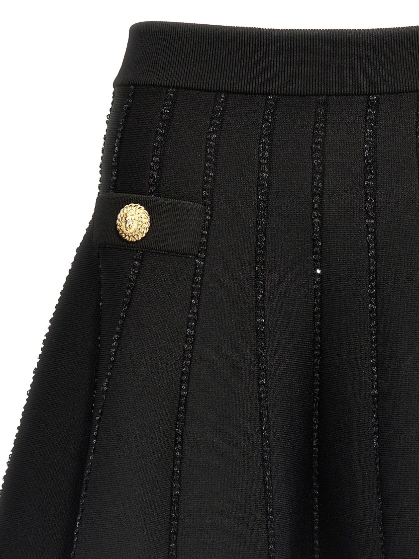 Balmain Flared Knitted Skirt With Sequin Detail And Trompe-l'œil Pockets In Black