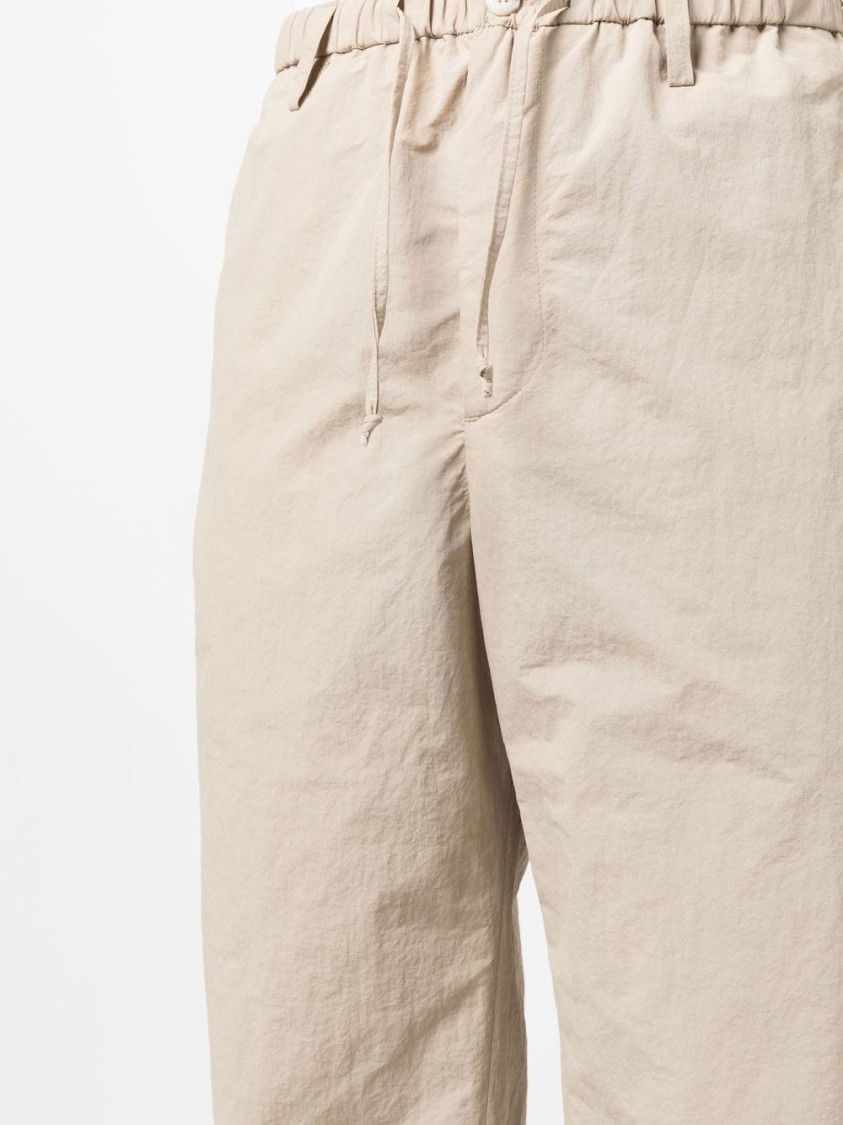 Nanushka Relaxed Fit Trousers With Elastic Waistband And Textured Fabric In Neutral