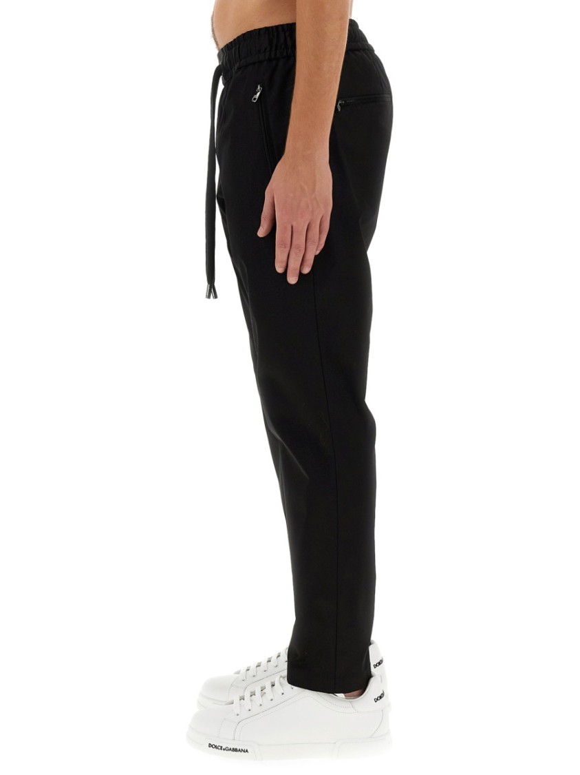 Dolce & Gabbana Jogging Pants With Plaque Detail In Black