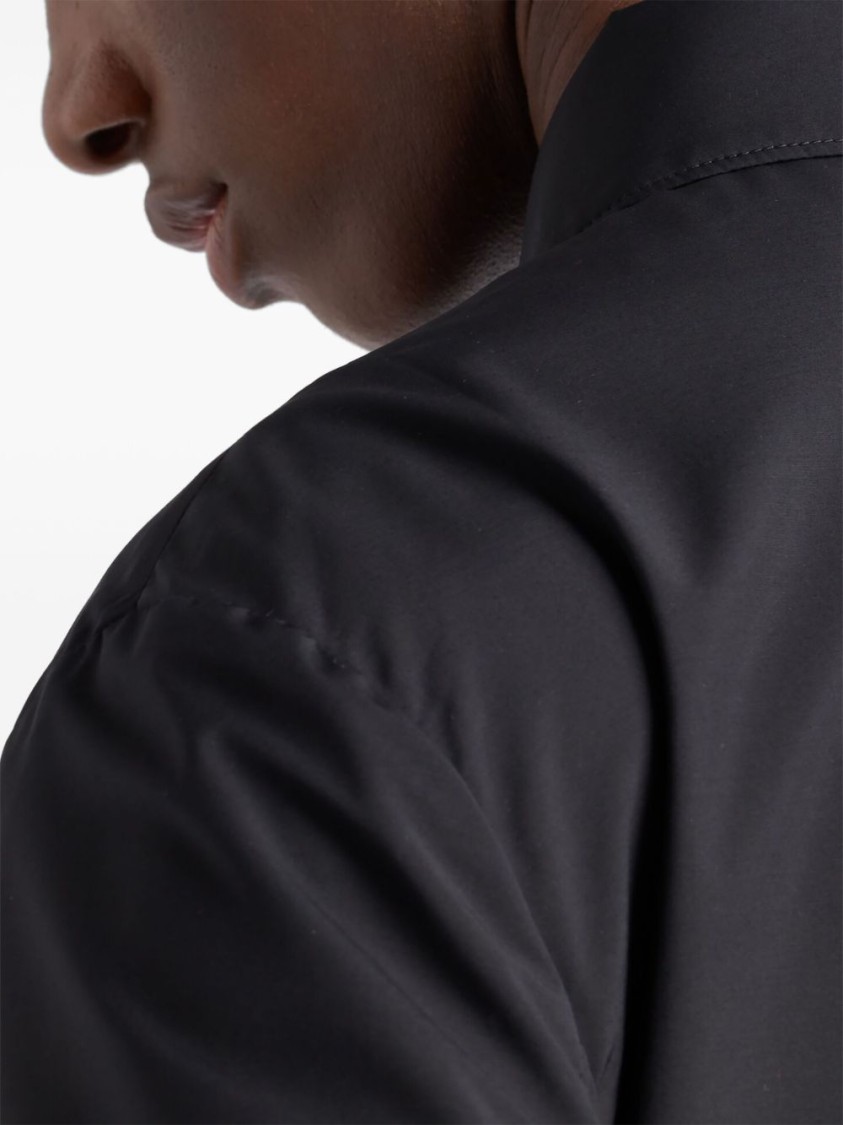 Prada Relaxed-fit Black Coat With Classic Button-up Design In Black