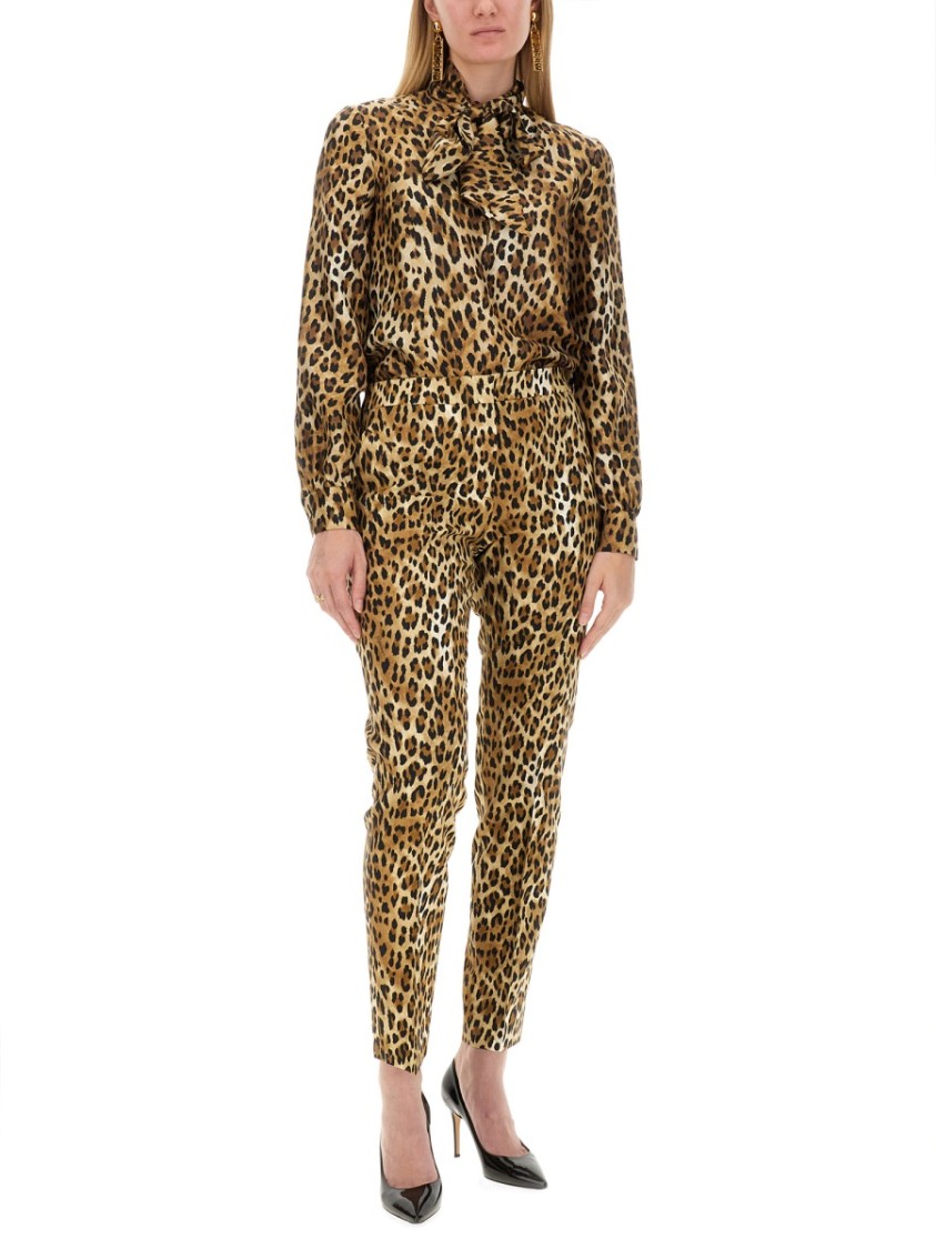 Shop Moschino Pants With Animal Pattern In Brown