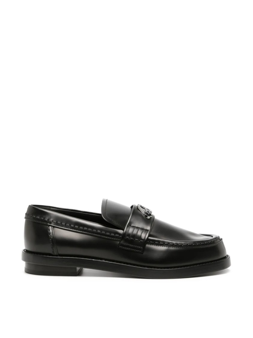 Alexander Mcqueen Seal Logo Plaque Loafers In Black