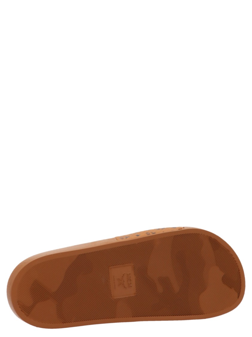 Mcm All-over Monogram Slides In Brown
