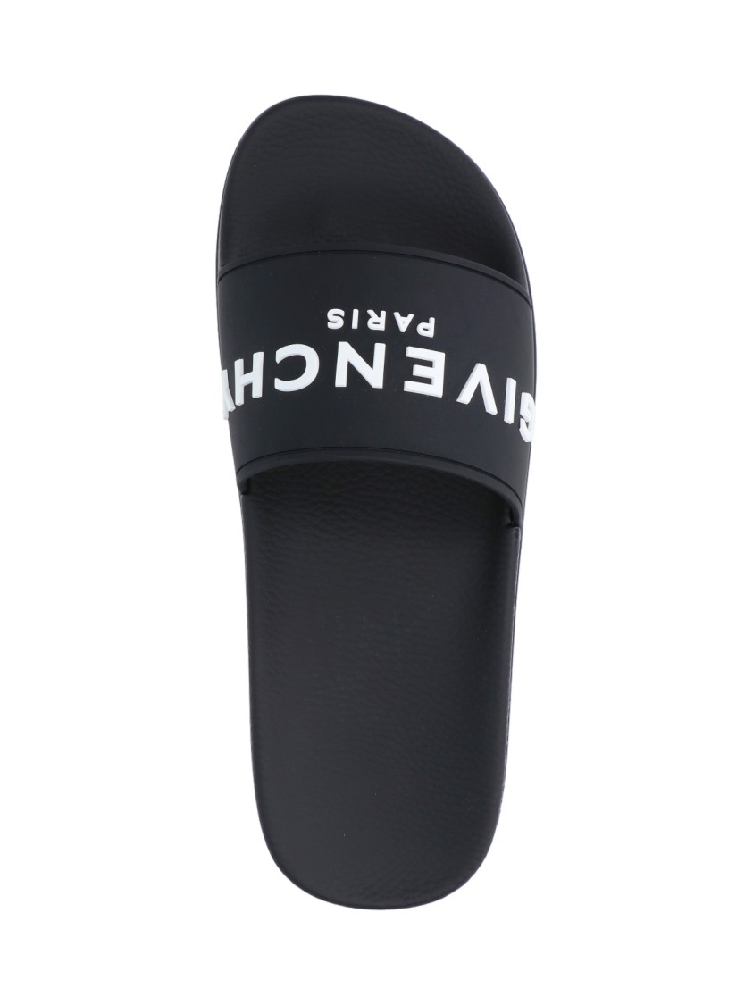 Givenchy Black Logo Embossed Slides In Black