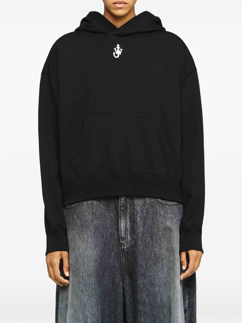 Jw Anderson J. W. Anderson Cropped Black Hoodie With Subtle Branding And Relaxed Fit In Black