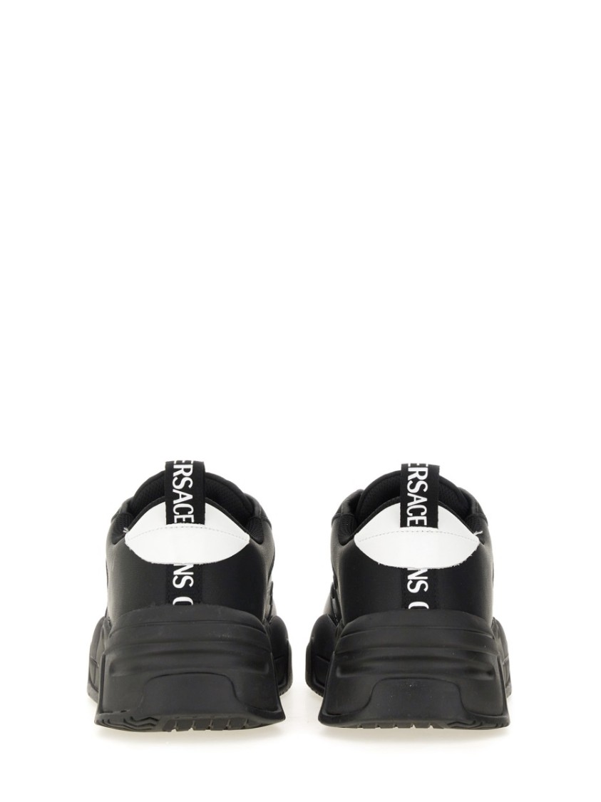 Shop Versace Jeans Couture Chunky Black Sneakers With Prominent Logo And Laces