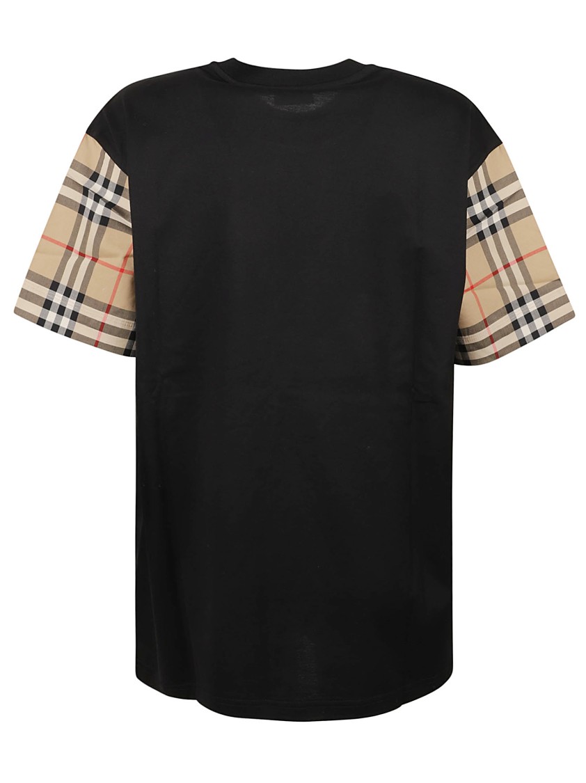 Burberry Black T-Shirt With Plaid Patterned Sleeves | THE LIST