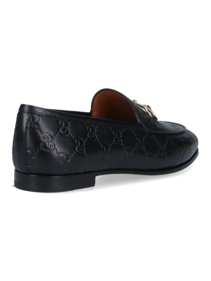 Gucci Jordaan Embossed Leather Loafers In Black