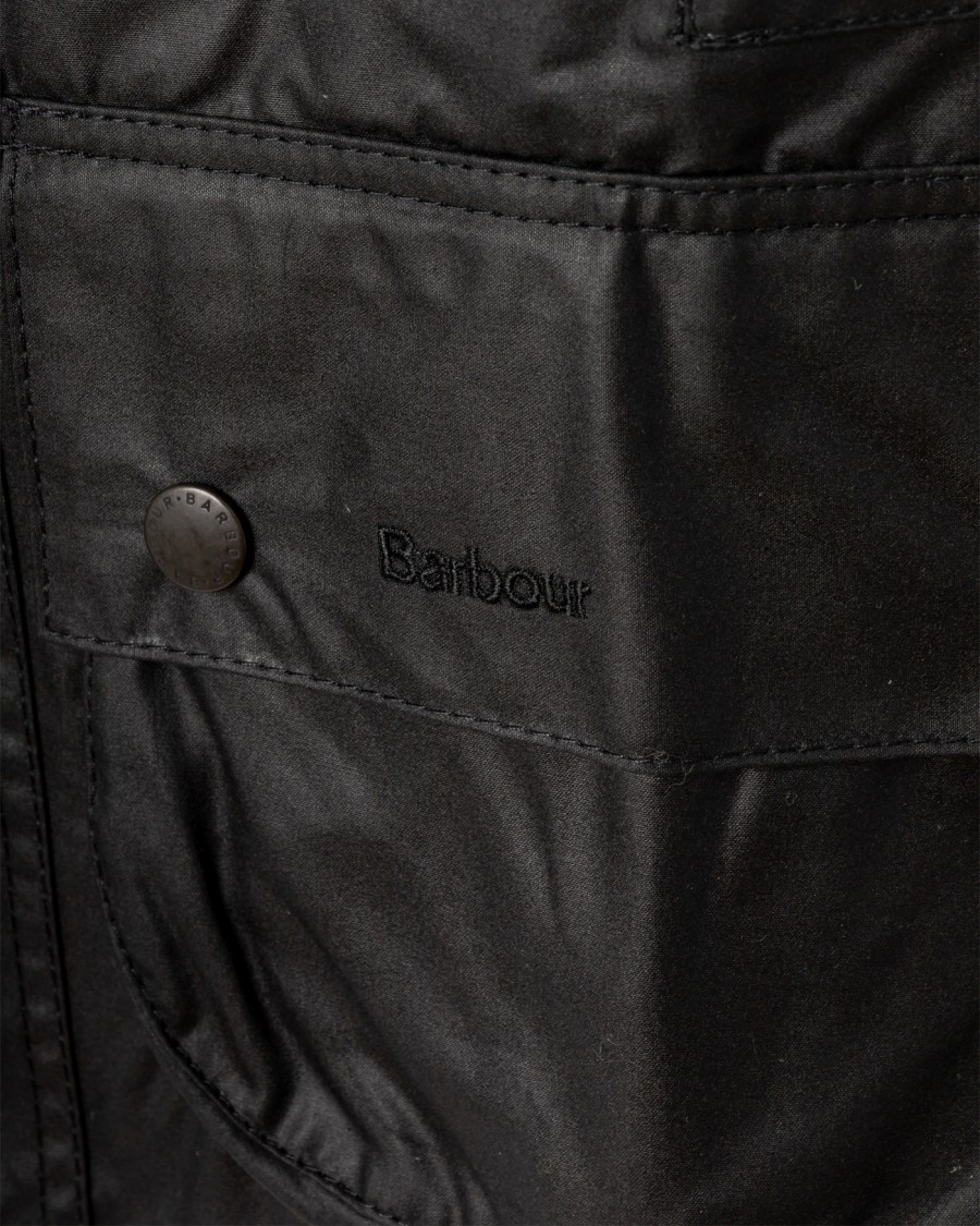 Barbour Beaufort Waxed Jacket With Detachable Hood And Rear Pocket In Black