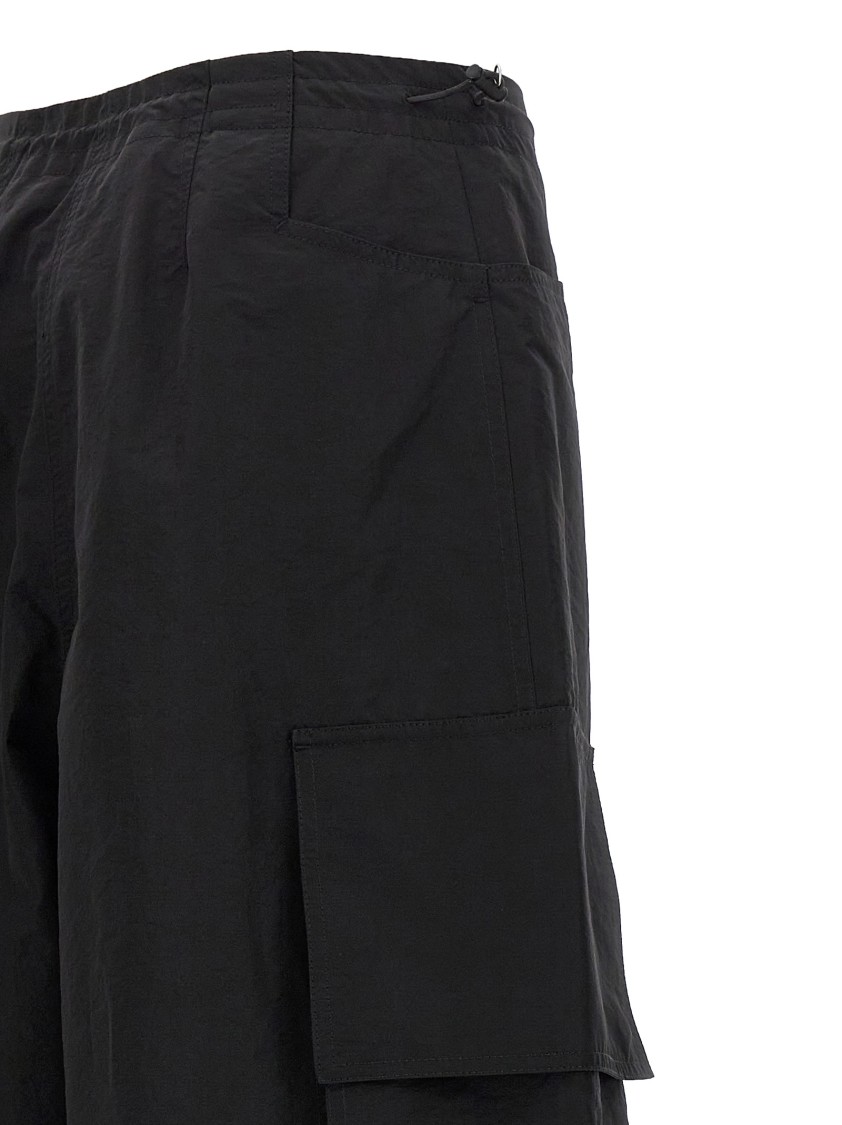 Palm Angels Wide-leg Nylon Parachute Pants With Adjustable Cuffs In Black