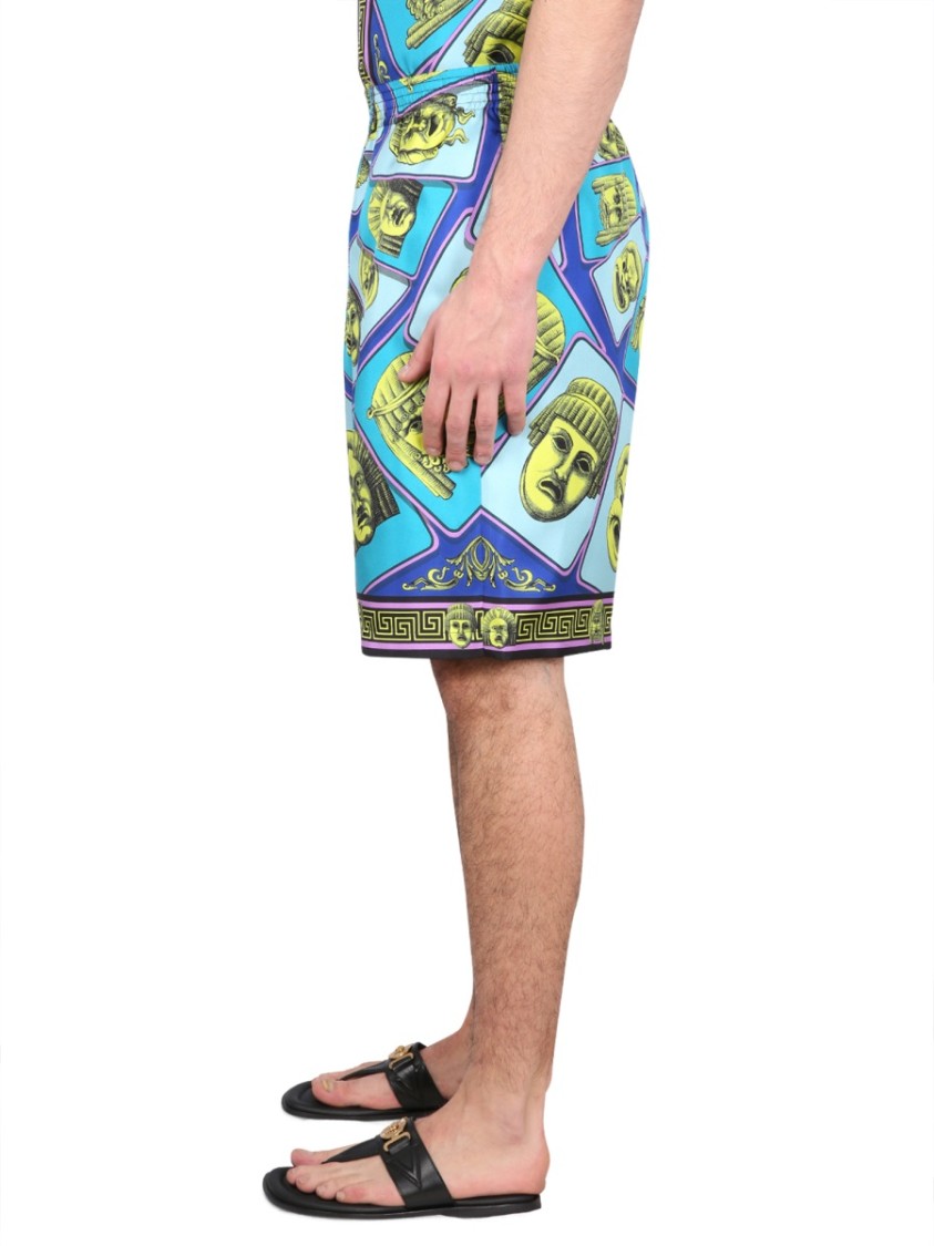Versace Le Maschere Print Silk Shorts In Green