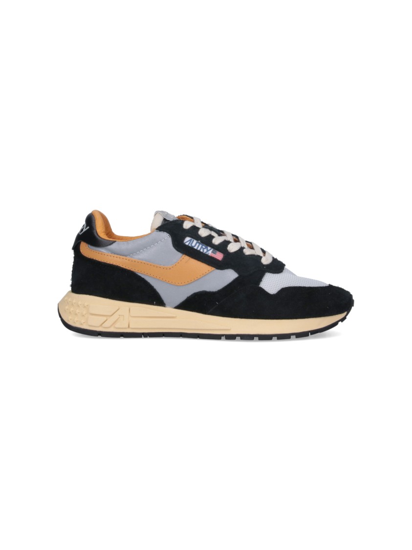 Autry Low Sneaker With Contrast Stitching And Mesh Panels In Black