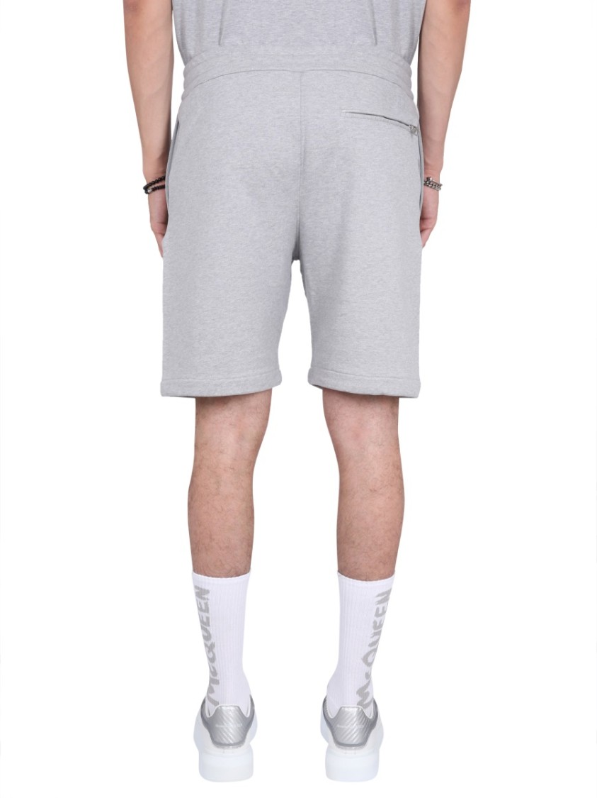 Alexander Mcqueen Men Bermuda Shorts With Graffiti Logo Print In Grey
