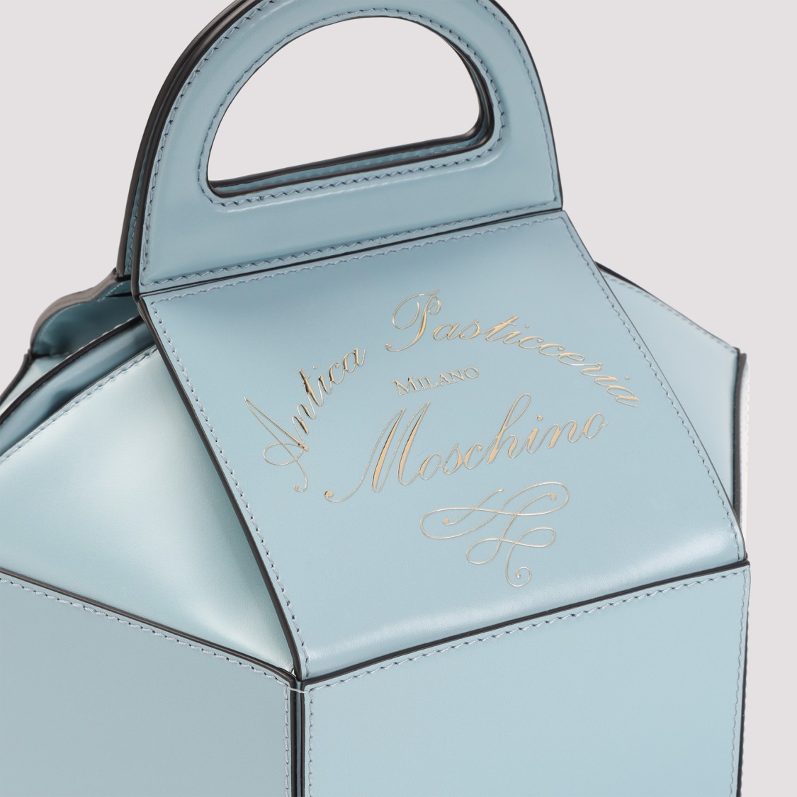Moschino Structured Blue Leather Handbag With Silhouette In Blue