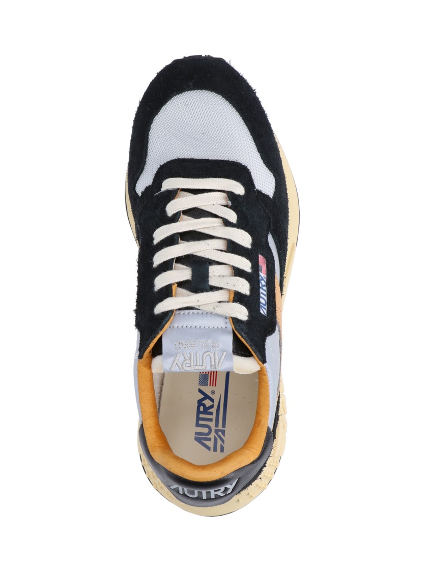 Autry Low Sneaker With Contrast Stitching And Mesh Panels In Black