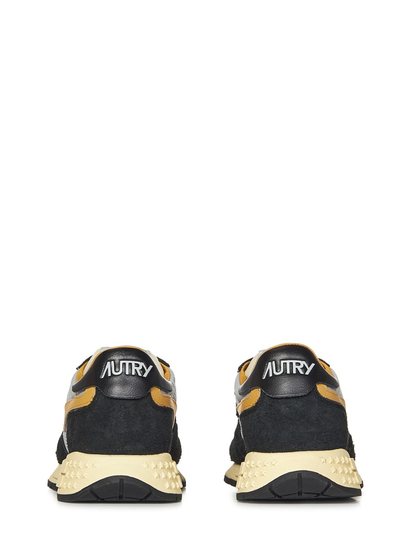 Autry Low Sneaker With Contrast Stitching And Mesh Panels In Black