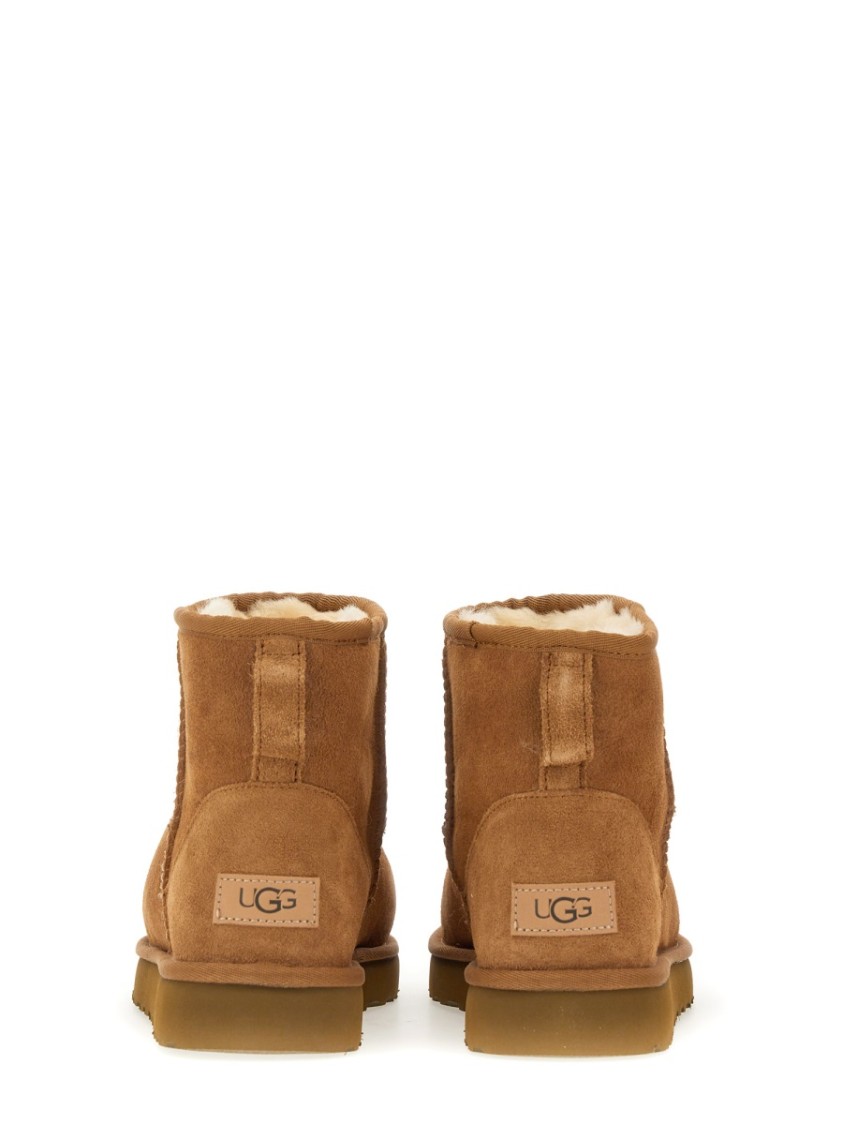 Shop Ugg Boot Classic Mini Ii In Brown