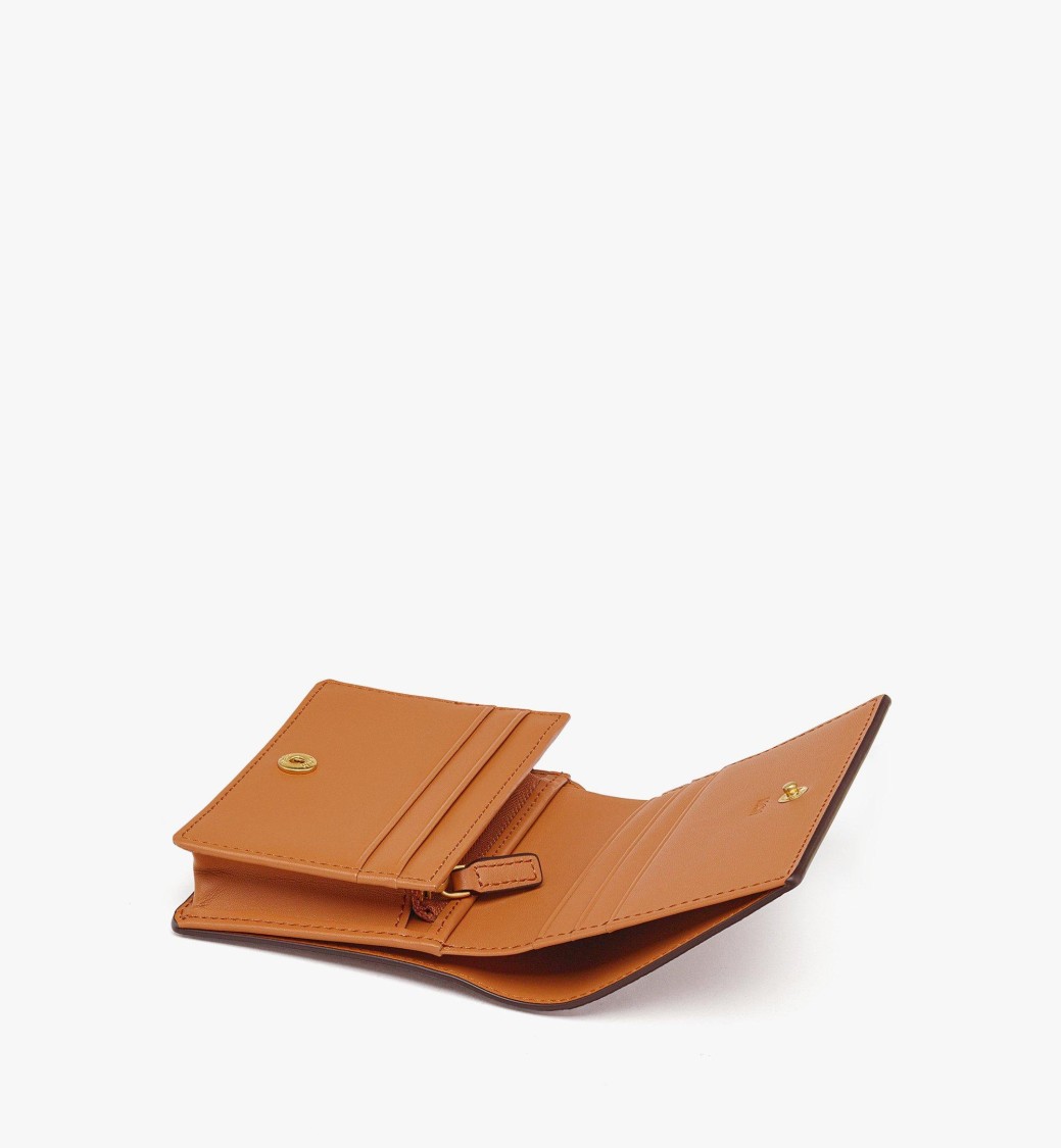 Mcm Embossed Leather Wallet With Noble Laurel Wreath In Brown