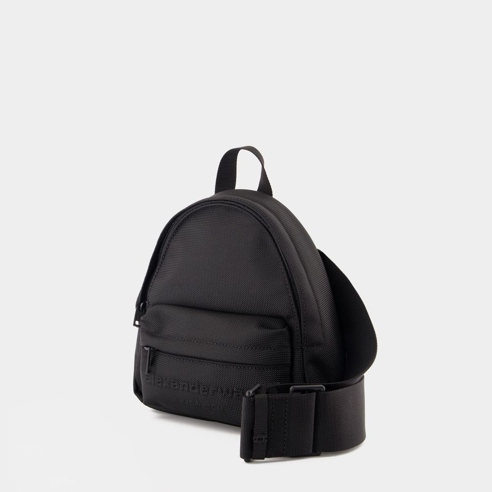 Shop Alexander Wang Punch Mini Sling Backpack - Nylon - Black